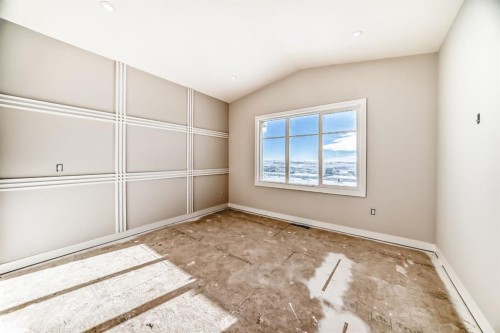 512 Heritage Boulevard, Cochrane, AB - Indoor Photo Showing Other Room