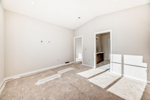 512 Heritage Boulevard, Cochrane, AB - Indoor Photo Showing Other Room