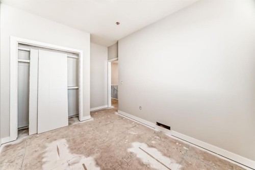 512 Heritage Boulevard, Cochrane, AB - Indoor Photo Showing Other Room