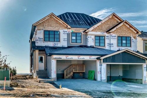524 Heritage Boulevard, Cochrane, AB - Outdoor With Facade