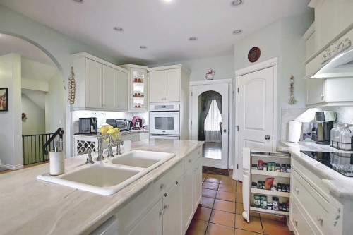 255046 Township Road 250, Rural Wheatland County, AB - Indoor Photo Showing Kitchen With Double Sink