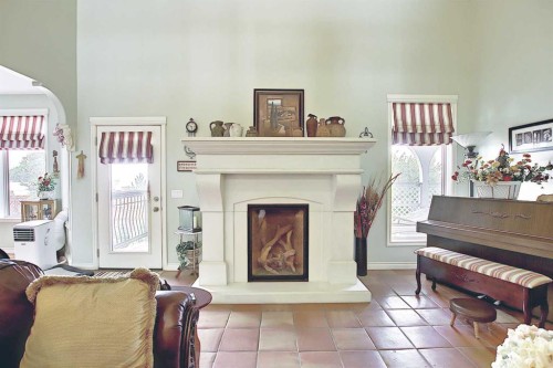 255046 Township Road 250, Rural Wheatland County, AB - Indoor With Fireplace