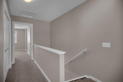 136 New Brighton Point Se, Calgary, AB - Indoor Photo Showing Other Room