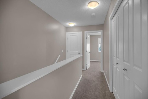 136 New Brighton Point Se, Calgary, AB - Indoor Photo Showing Other Room