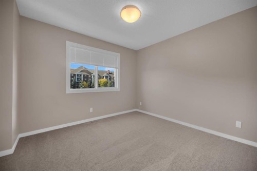 136 New Brighton Point Se, Calgary, AB - Indoor Photo Showing Other Room