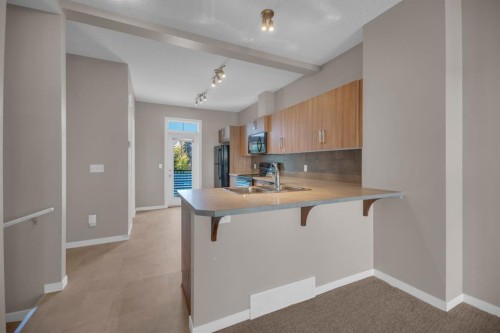 136 New Brighton Point Se, Calgary, AB - Indoor Photo Showing Kitchen