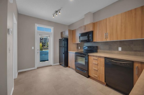 136 New Brighton Point Se, Calgary, AB - Indoor Photo Showing Kitchen