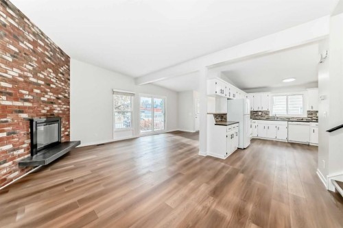 6525 58 Street Nw, Calgary, AB - Indoor Photo Showing Other Room With Fireplace