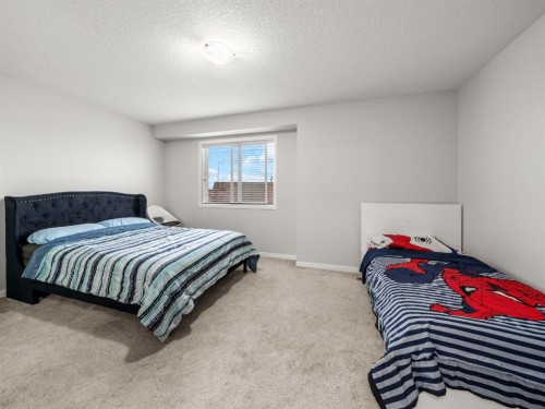410 Copperstone Manor Se, Calgary, AB - Indoor Photo Showing Bedroom