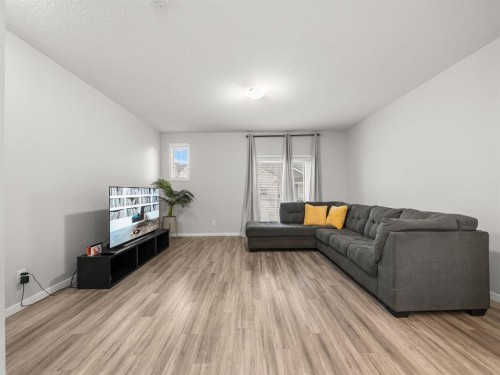 410 Copperstone Manor Se, Calgary, AB - Indoor Photo Showing Living Room