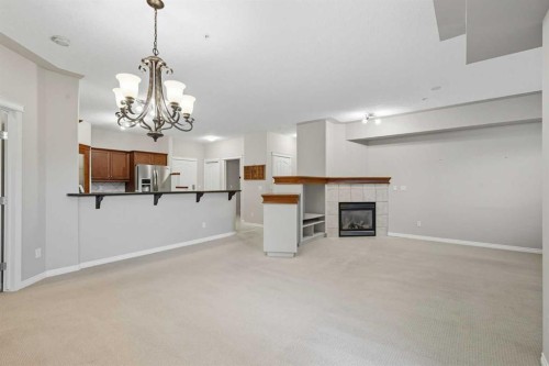 240-30 Sierra Morena Landing Sw, Calgary, AB - Indoor With Fireplace