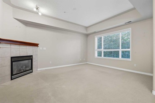 240-30 Sierra Morena Landing Sw, Calgary, AB - Indoor With Fireplace