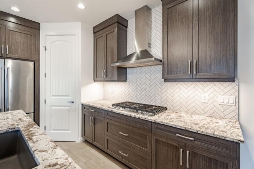 55 Legacy Woods Bay Se, Calgary, AB - Indoor Photo Showing Kitchen With Upgraded Kitchen