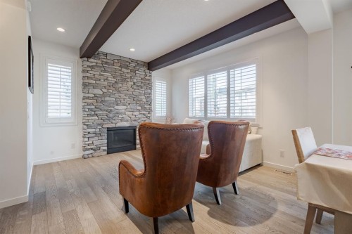 55 Legacy Woods Bay Se, Calgary, AB - Indoor With Fireplace