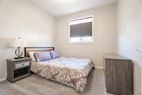 55 Legacy Woods Bay Se, Calgary, AB - Indoor Photo Showing Bedroom