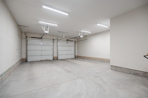 55 Legacy Woods Bay Se, Calgary, AB - Indoor Photo Showing Garage