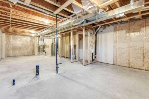 150 Edith Green Nw, Calgary, AB - Indoor Photo Showing Basement