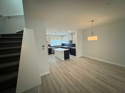 150 Edith Green Nw, Calgary, AB - Indoor Photo Showing Other Room
