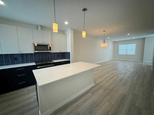 150 Edith Green Nw, Calgary, AB - Indoor Photo Showing Kitchen With Upgraded Kitchen