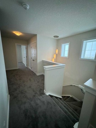 150 Edith Green Nw, Calgary, AB - Indoor Photo Showing Other Room