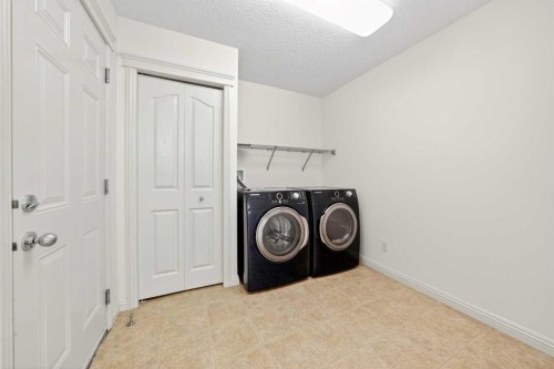 320 Everbrook Way Sw, Calgary, AB - Indoor Photo Showing Laundry Room