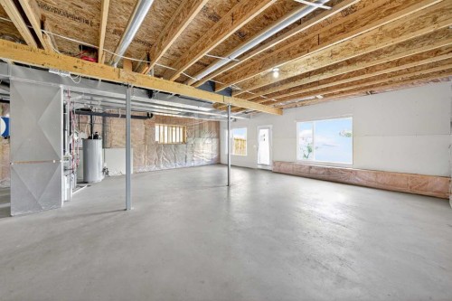 320 Everbrook Way Sw, Calgary, AB - Indoor Photo Showing Basement