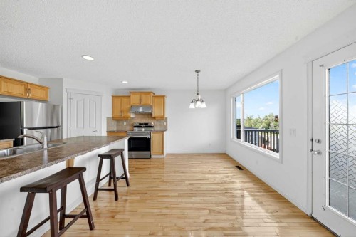320 Everbrook Way Sw, Calgary, AB - Indoor Photo Showing Kitchen With Double Sink