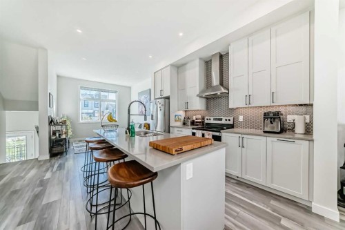 158 Les Jardins Park Se, Calgary, AB - Indoor Photo Showing Kitchen With Upgraded Kitchen