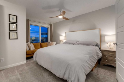 605-474 Seton Circle Se, Calgary, AB - Indoor Photo Showing Bedroom
