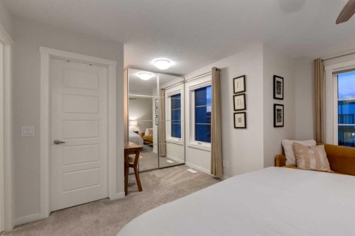 605-474 Seton Circle Se, Calgary, AB - Indoor Photo Showing Bedroom