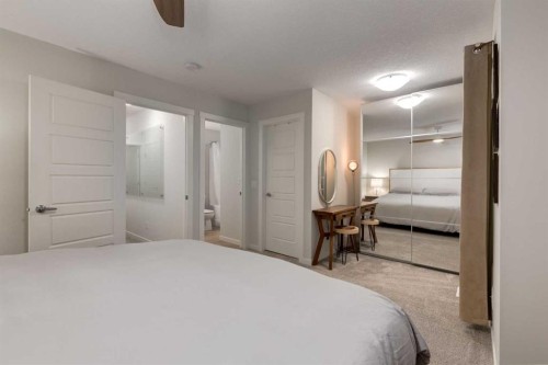 605-474 Seton Circle Se, Calgary, AB - Indoor Photo Showing Bedroom