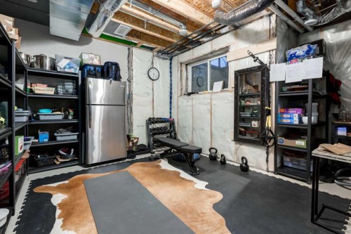 605-474 Seton Circle Se, Calgary, AB - Indoor Photo Showing Basement