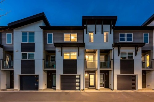 605-474 Seton Circle Se, Calgary, AB - Outdoor With Balcony With Facade