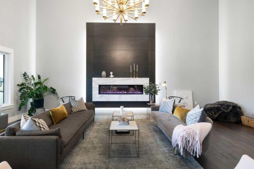 30 Dunes Drive, Desert Blume, AB - Indoor Photo Showing Living Room With Fireplace