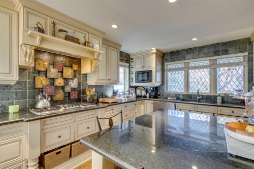 1302 Frontenac Avenue Sw, Calgary, AB - Indoor Photo Showing Kitchen With Double Sink