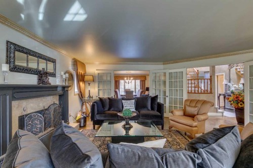 1302 Frontenac Avenue Sw, Calgary, AB - Indoor Photo Showing Living Room With Fireplace