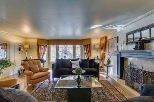 1302 Frontenac Avenue Sw, Calgary, AB - Indoor Photo Showing Living Room With Fireplace