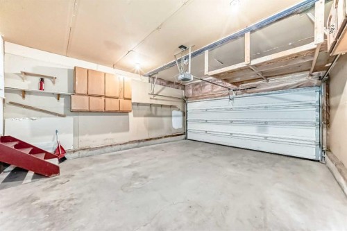 139 Bridlewood Circle Sw, Calgary, AB - Indoor Photo Showing Garage