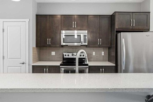 22 Nolan Hill Gate Nw, Calgary, AB - Indoor Photo Showing Kitchen With Upgraded Kitchen