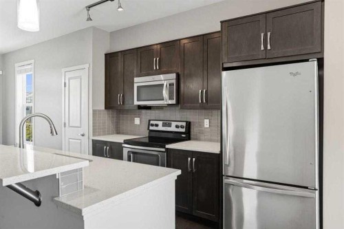 22 Nolan Hill Gate Nw, Calgary, AB - Indoor Photo Showing Kitchen With Upgraded Kitchen