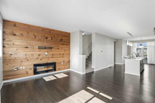 22 Nolan Hill Gate Nw, Calgary, AB - Indoor Photo Showing Living Room With Fireplace