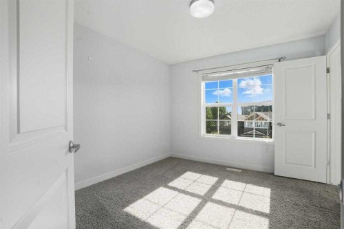 22 Nolan Hill Gate Nw, Calgary, AB - Indoor Photo Showing Other Room