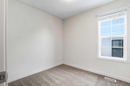 22 Nolan Hill Gate Nw, Calgary, AB - Indoor Photo Showing Other Room