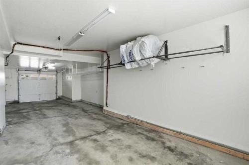 22 Nolan Hill Gate Nw, Calgary, AB - Indoor Photo Showing Garage