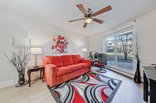 112-380 Marina Drive, Chestermere, AB - Indoor Photo Showing Living Room