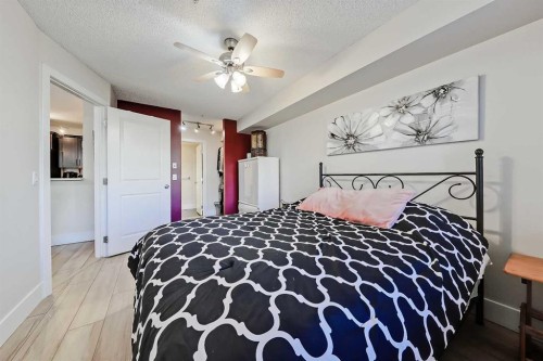 112-380 Marina Drive, Chestermere, AB - Indoor Photo Showing Bedroom