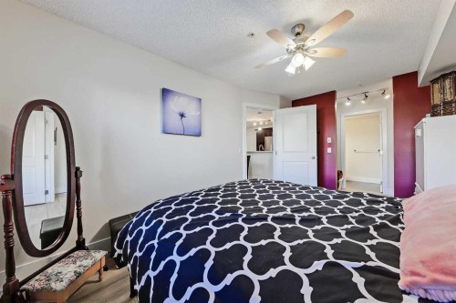 112-380 Marina Drive, Chestermere, AB - Indoor Photo Showing Bedroom