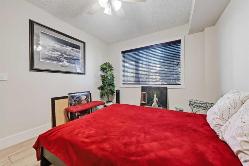 112-380 Marina Drive, Chestermere, AB - Indoor Photo Showing Bedroom