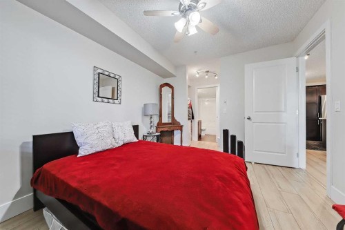 112-380 Marina Drive, Chestermere, AB - Indoor Photo Showing Bedroom