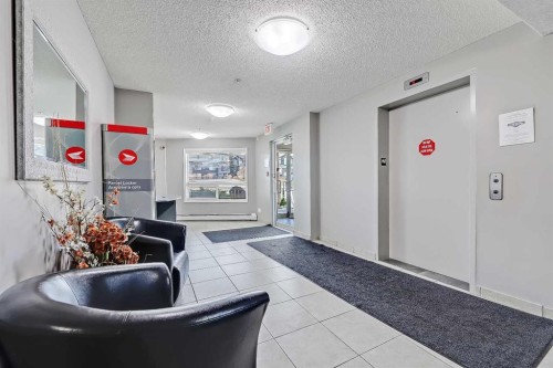 112-380 Marina Drive, Chestermere, AB - Indoor Photo Showing Other Room